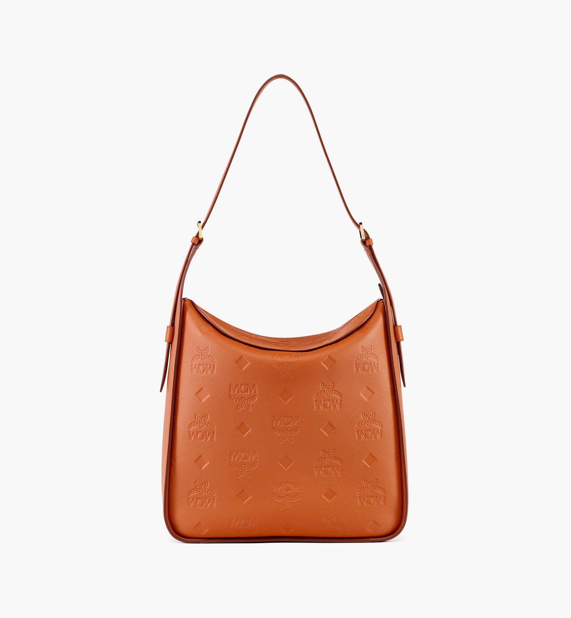 Sac hobo Aren à rabat en cuir monogrammé embossé 1